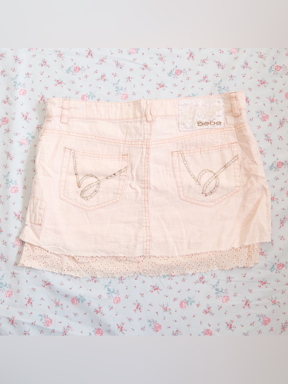 Bebe Pink Denim Mini Skirt with Rhinestone Pocket Detail